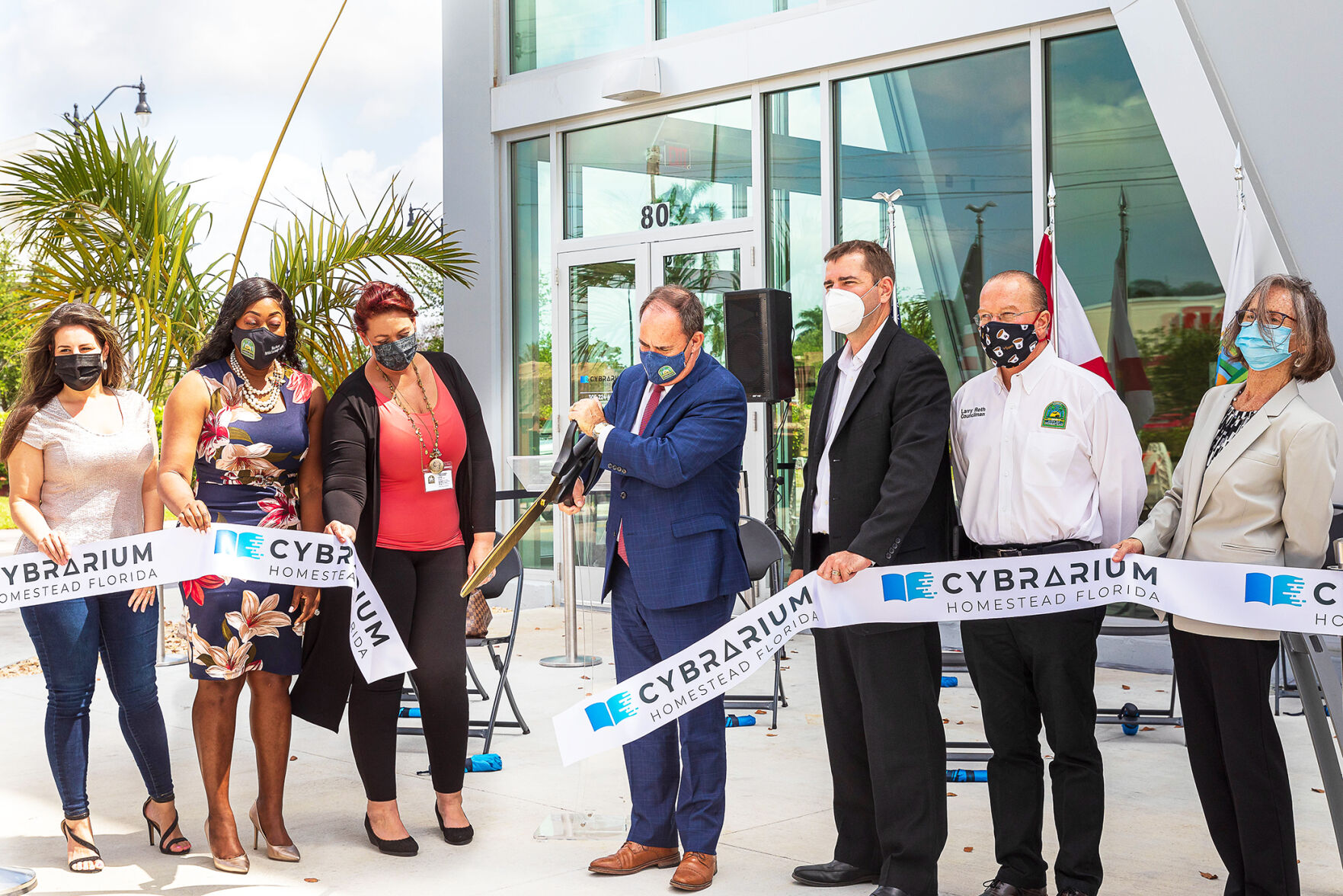 Above: Homestead’s Cybrarium held their grand opening with a ribbon cutting. From left, Councilwoman Avila, Vice Mayor Fairclough-Staggers, Councilwoman Bailey, Mayor Losner, Councilman Shelly, Councilman Roth, and City Manager McCaffrey.